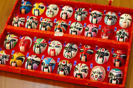 Handmade souvenirs for sale in a shop window, close-upの写真素材