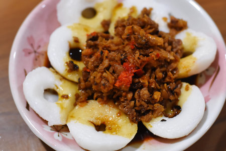Stir-fried pork with boiled egg on plate. Thai food