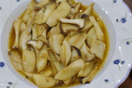Stir fried mixed mushrooms with garlic butterの写真素材