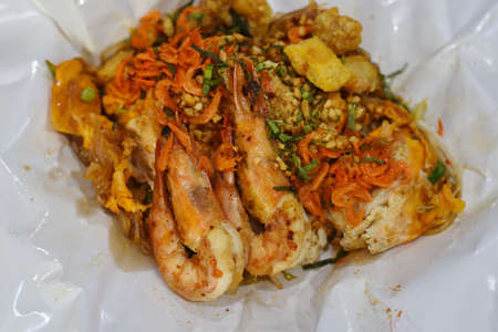 Fried noodle Thai style with prawnsの写真素材