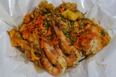 Fried noodle Thai style with prawnsの写真素材