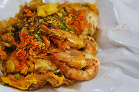 Fried noodle Thai style with prawnsの写真素材