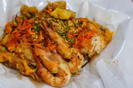 Fried noodle Thai style with prawnsの写真素材