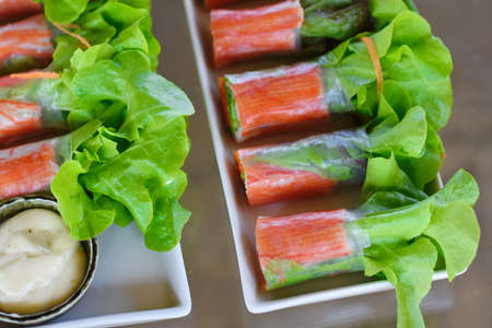 Salad roll with crab stick on the table. Healthy food concept.の写真素材