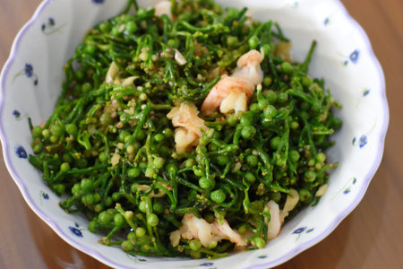 stir-fried green peas with shrimps on the plate