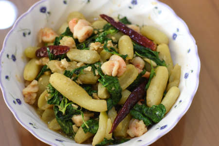 Stir-fried vegetables with shrimps in a bowl.の写真素材