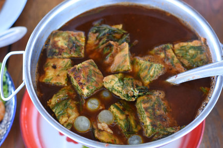 Korean food, omelet and rice cake in a potの写真素材