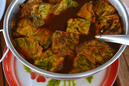 Thai food, deep-fried fish cake in the pot.の写真素材