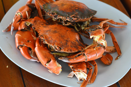 Steamed crabs on a plate. Seafood. Close-up.の写真素材