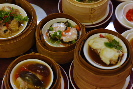 Chinese dim sum in bamboo steamer, chinese traditional food.の写真素材