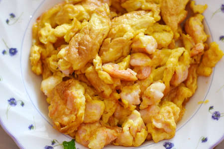 Scrambled eggs with prawns, Thai style food.の写真素材