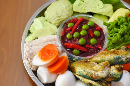 Thai food, boiled egg, shrimp paste, fish and vegetables
