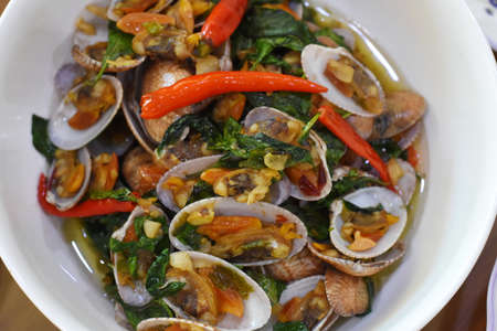Stir-fried clams with chili and basil, Thai foodの写真素材