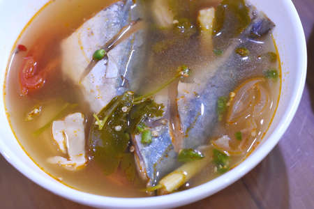 Thai spicy soup with mackerel fish in a bowl.の写真素材