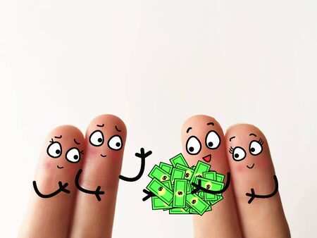 Four fingers are decorated as four person. Two of them is sending some cash money to another two. They are kind.の写真素材