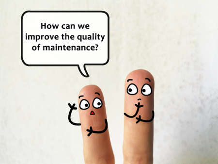 Two fingers are decorated as two person. They are discussing about problems of building. One of them is asking about ways to improve quality of maintenance.の写真素材