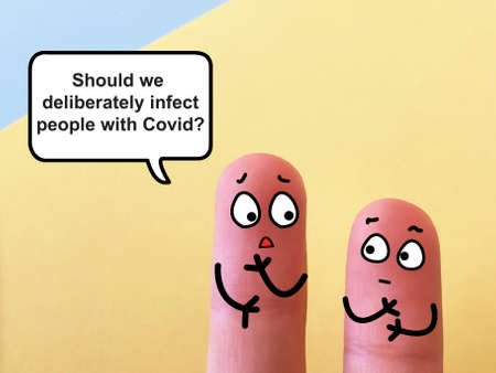 Two fingers are decorated as two person. They are discussing about coronavirus.の写真素材
