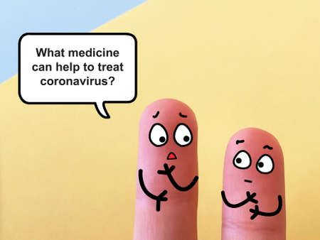 Two fingers are decorated as two person. They are discussing about best medicine to treat coronavirus infection.の写真素材