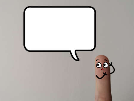 One finger is decorated as a person. They person is asking about question regarding cyber attack and security.の写真素材