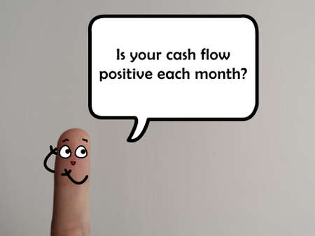 One finger is decorated as a person. The person is asking question about business. He wants to know about your cash flow.の写真素材