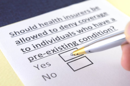 One person is answering question about health insurance.の写真素材