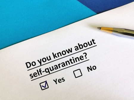 One person is answering question about pandemic.  He knows about self quarantine.の写真素材