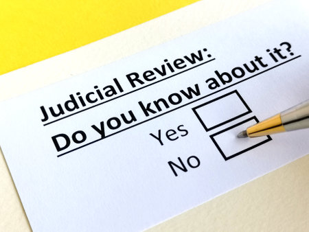 One person is answering question about judicial review.の写真素材