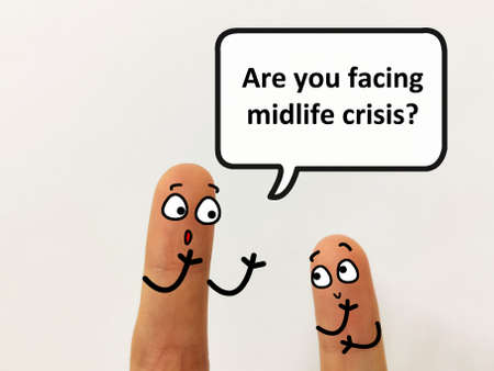 Two fingers are decorated as two person. One of them is asking another if he is facing midlife crisis.の写真素材