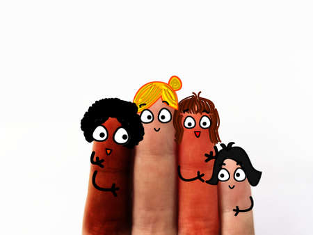 Four fingers are decorated as four woman with different age. They are happy.の写真素材