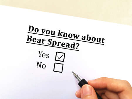 One person is answering question about stocks. He knows about bread spreadの写真素材