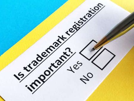 One person is answering question about trademark registration.の写真素材