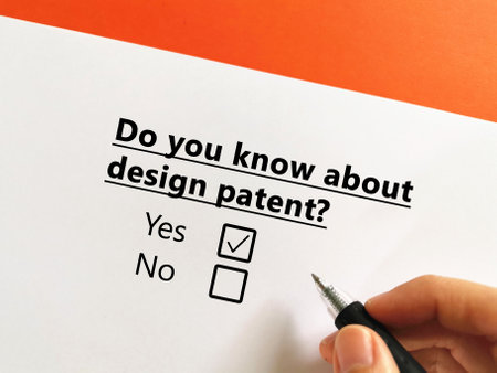One person is answering question about intellectual property law. He knows about design patentの写真素材