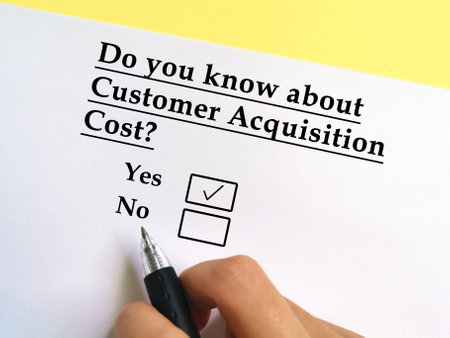 One person is answering question about finance. He knows about customer acquisition cost.の写真素材