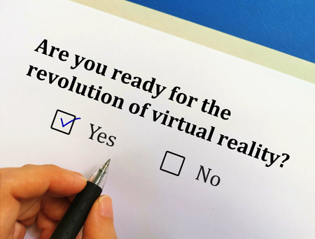One person is answering question about revolution. He is ready for  revolution of  virtual reality.の写真素材
