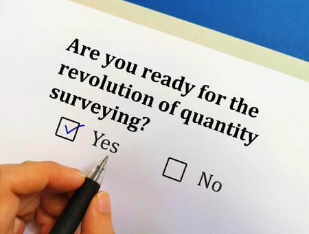 One person is answering question about revolution. He is ready for  revolution of  quantity surveying.の写真素材