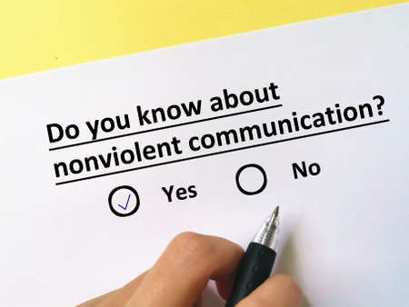 One person is answering question about psychotherapy. The person knows about nonviolent communicationの写真素材