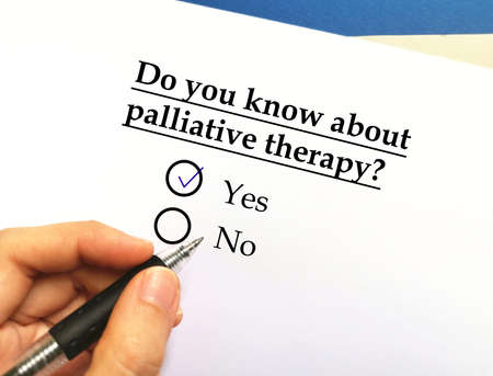 One person is answering question about therapy. He knows about palliative therapyの写真素材