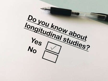 One person is answering question about research. The person knows about longitudinal studies.の写真素材