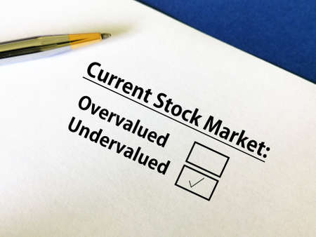 One person is answering question about inflation. He thinks current stock market is undervalued.の写真素材