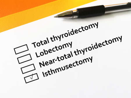 One person is answering question about thyroid pathology. The person chooses isthmusectomy.の写真素材