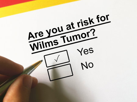 One person is answering question about cancer risk. He is at risk for Wilms Tumor.