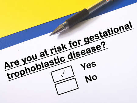 One person is answering question about cancer risk. He is at risk for gestational trophoblastic disease.の写真素材