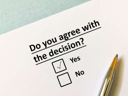 One person is answering question about conflict and war. The person agrees with the decision.の写真素材