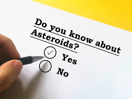 One person is answering question about space technology. He knows about Asteroids.