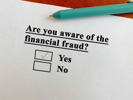 One person is answering question about scam and fraud. He is aware of the financial fraud.の写真素材