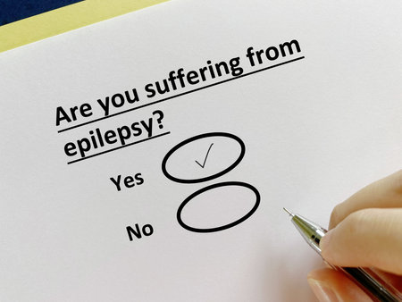 A person is answering question about illness. She is suffering from epilepsy.
