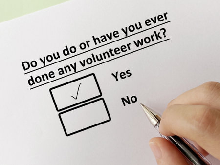 One person is answering question. He has done volunteer work.の写真素材