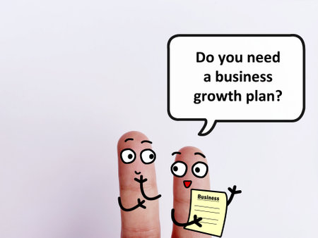 Two fingers are decorated as two person. One of them is asking another if he needs a business growth plan.の写真素材