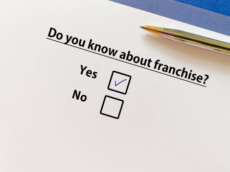 One pereson is answering question about business. He knows about franchise.の写真素材