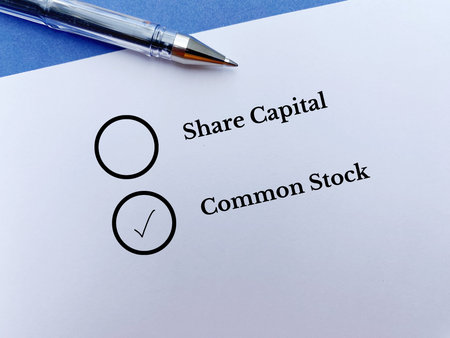 One person is answering question. He chooses common stock over share capital